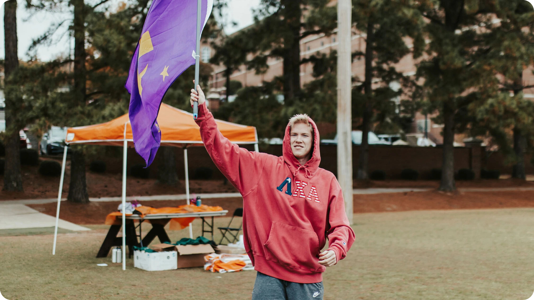 Member holding LCA Flag
