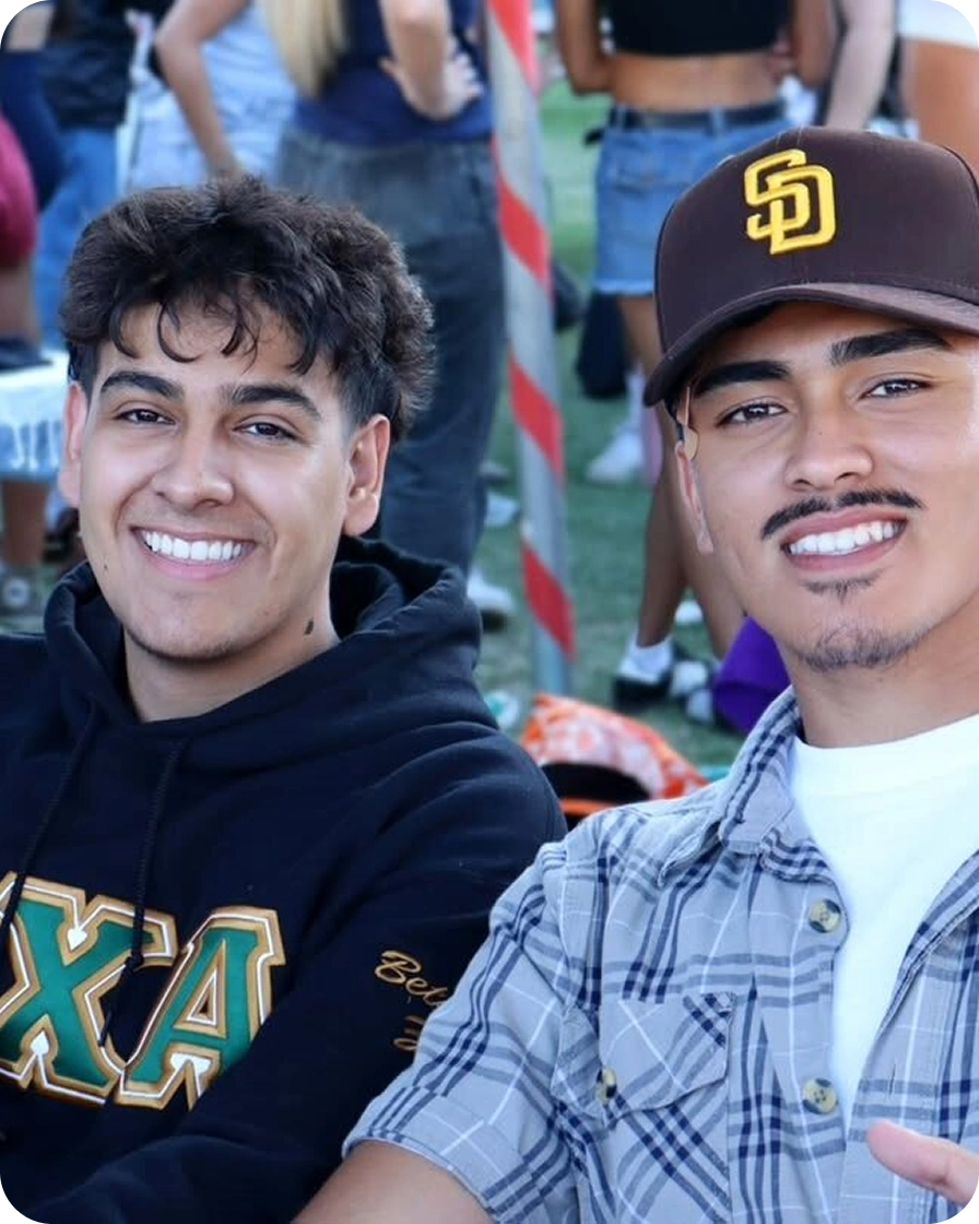 Two Members smiling